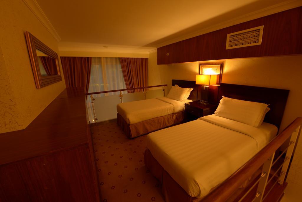 Retaj Al Bayt Suites Mekka Rum bild